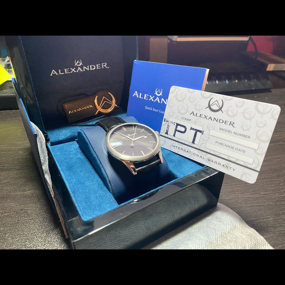 Stainless Steal Watch with black face, leather strap. New w/ box & certificates
